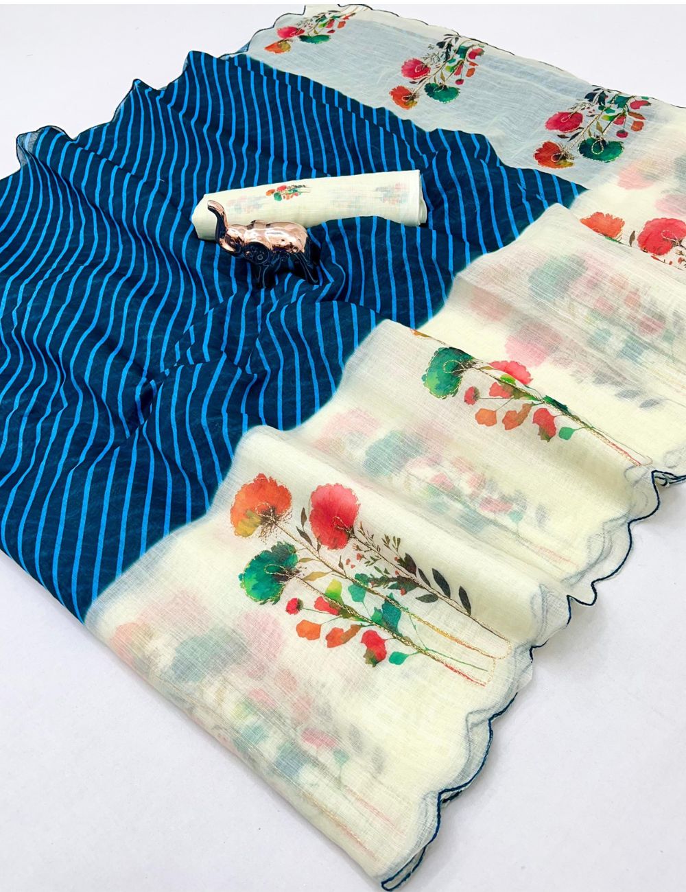 Blue color scalloped kantha work linen saree with contrast blouse
