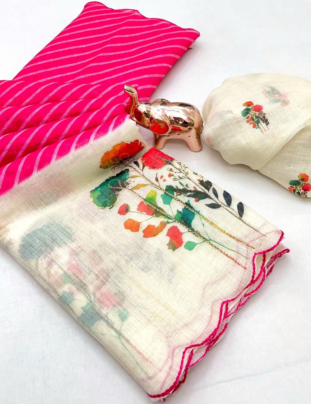 Pink color scalloped kantha work linen saree with contrast blouse