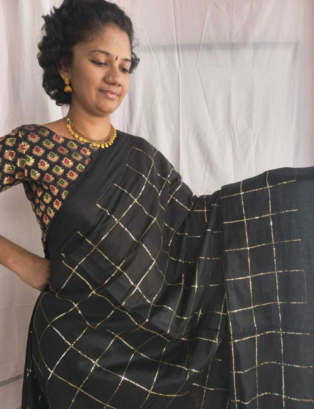 Mulmul Sequence Black Tissue saree with beautiful tussels