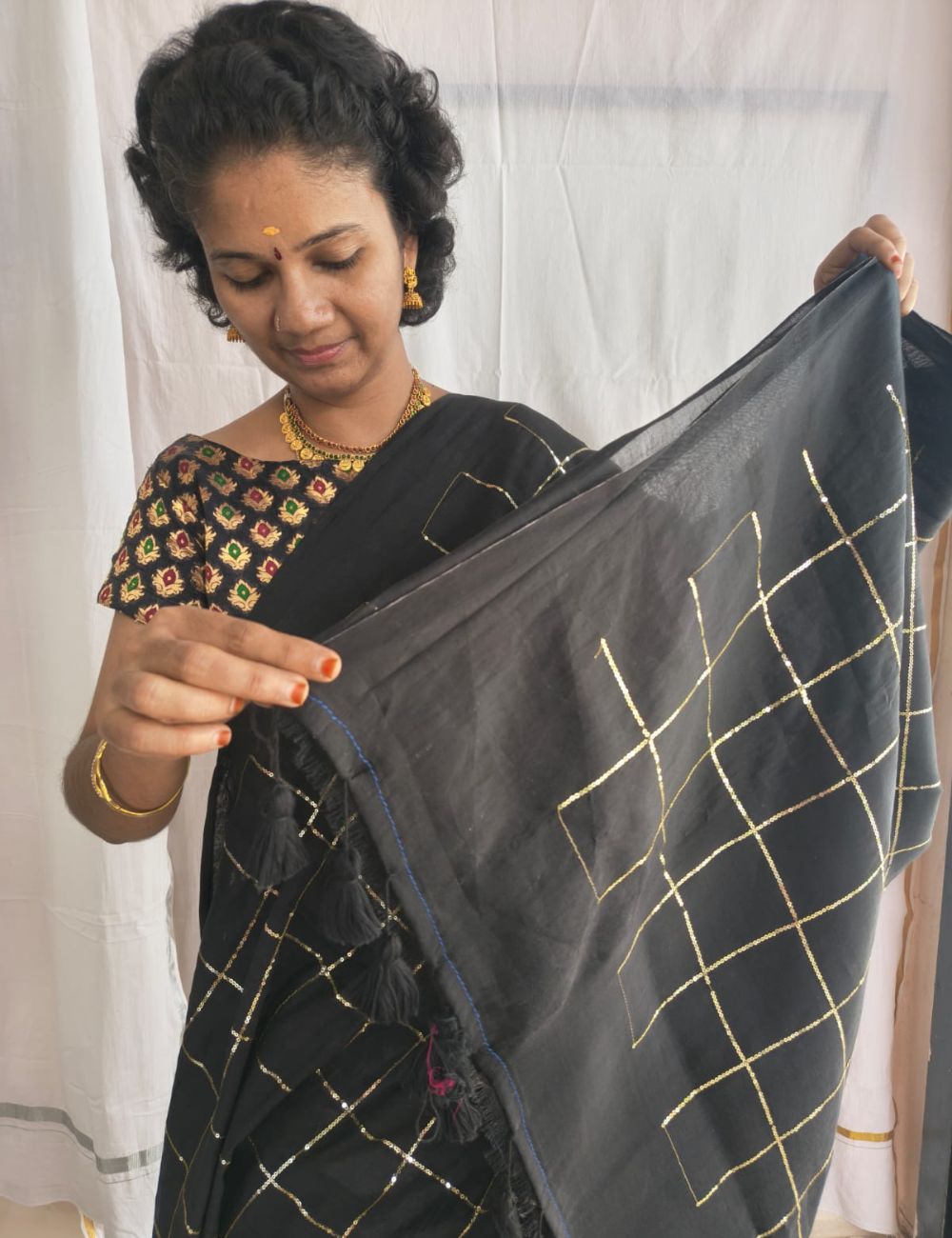Mulmul Sequence Black Tissue saree with beautiful tussels