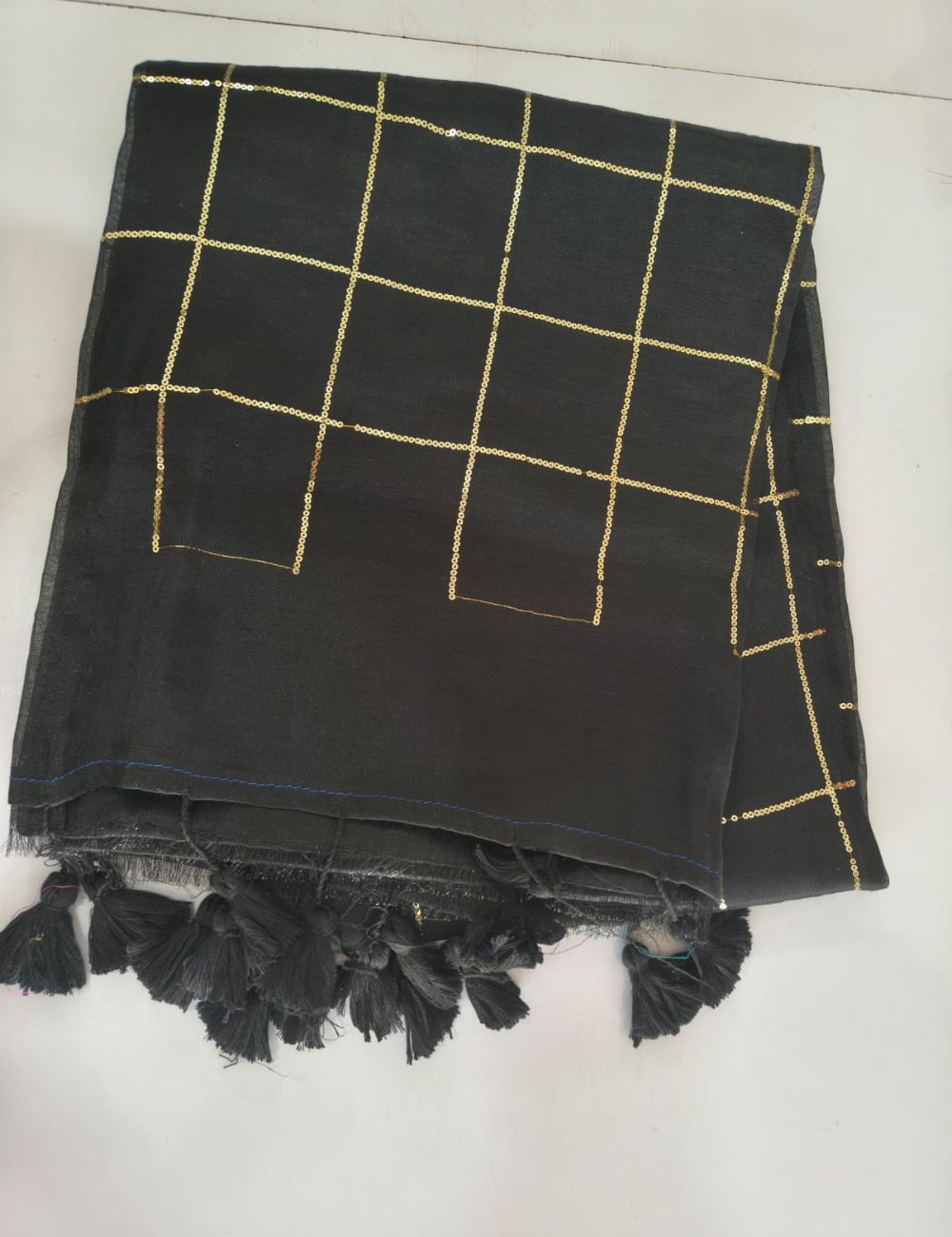 Mulmul Sequence Black Tissue saree with beautiful tussels