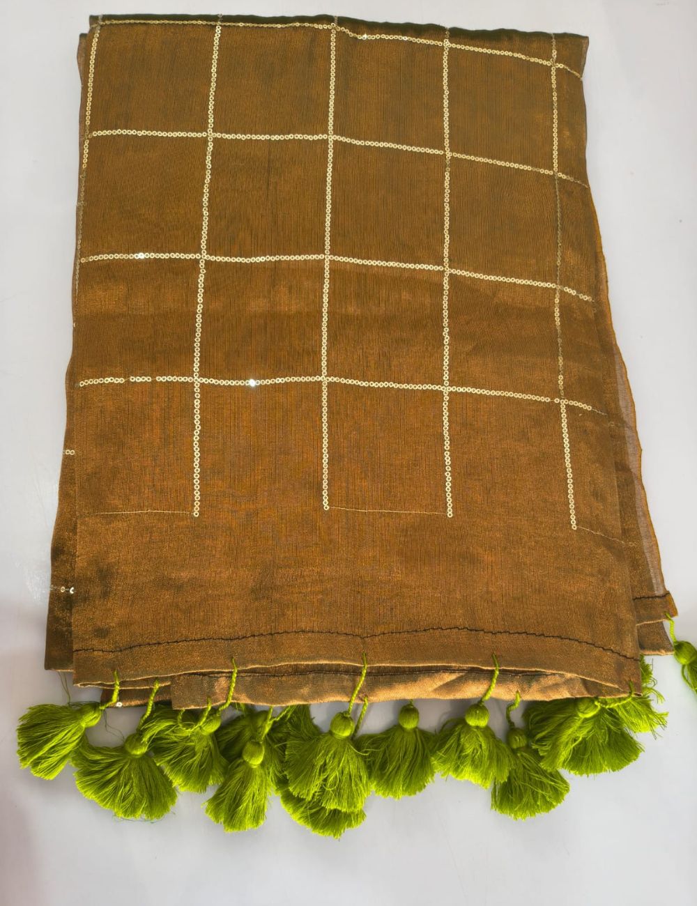 Mulmul Sequence Dual shaded Brown and green tissue Saree with beautiful tussels