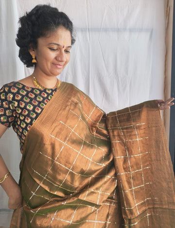 Mulmul Sequence Dual shaded Brown and green tissue Saree with beautiful tussels