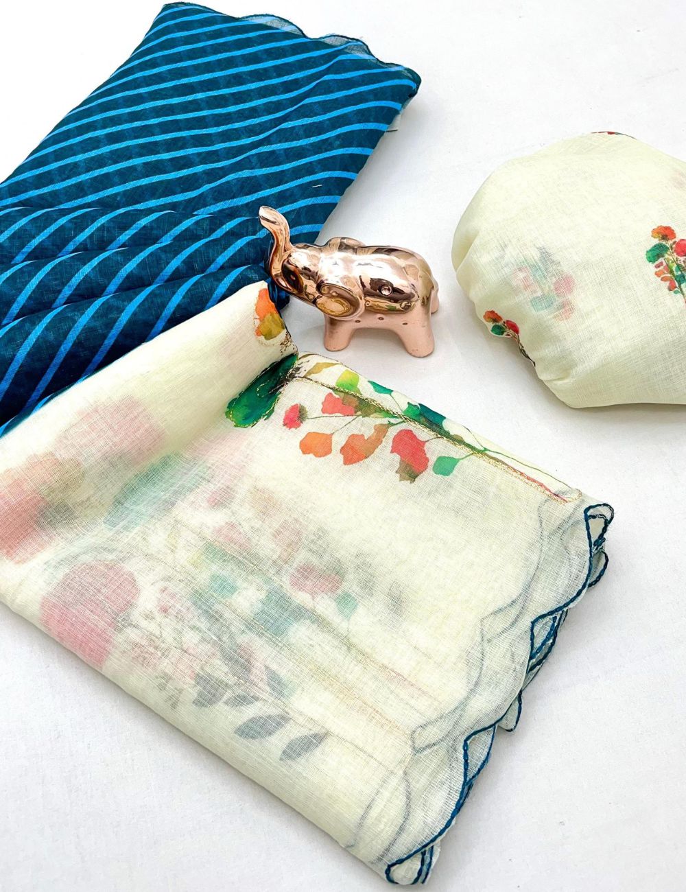 Blue color scalloped kantha work linen saree with contrast blouse