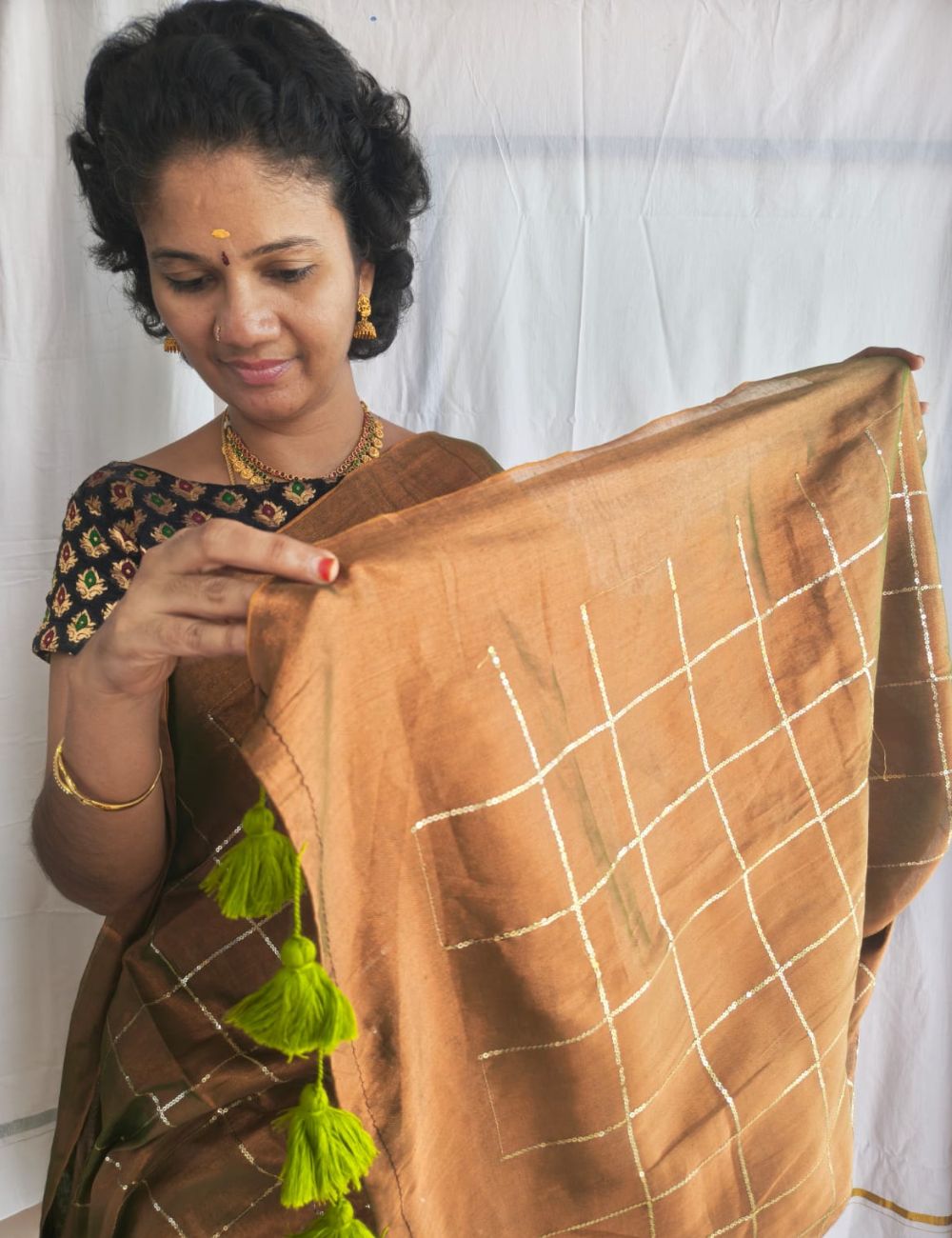 Mulmul Sequence Dual shaded Brown and green tissue Saree with beautiful tussels