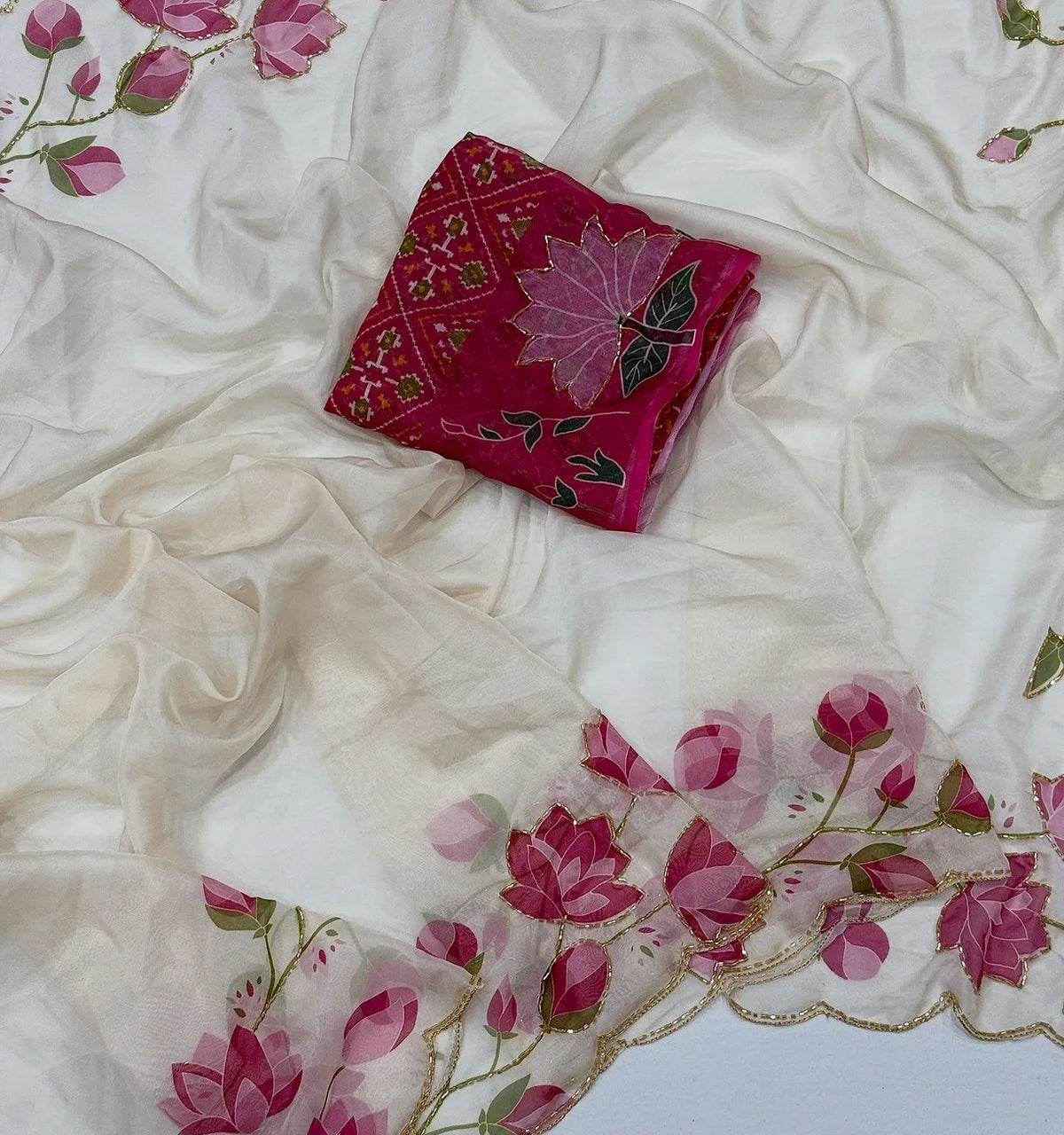 Tebi silk saree with floral cutdana design